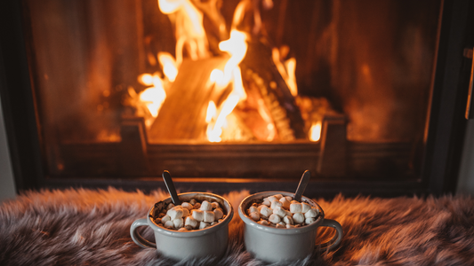 In the cozy warmth of a living room, a crackling fireplace radiates gentle heat, casting a soft glow across the scene.