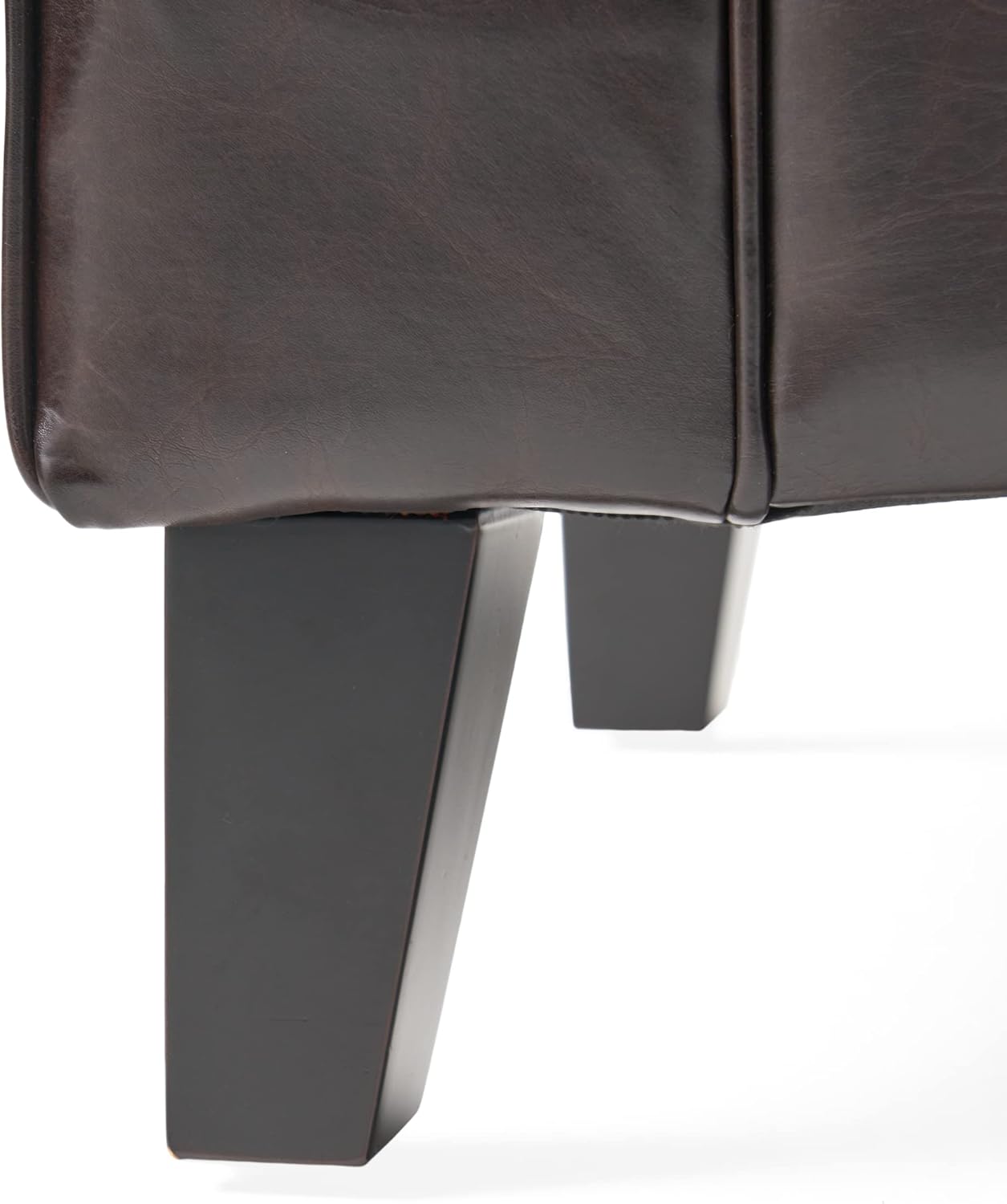 Stylish brown storage ottoman with button-tufted diamond stitch, rolled arms, and spacious interior for pillows and blankets. Crafted from durable PU leather and birch wood, perfect for seating and storage in modern living spaces.
