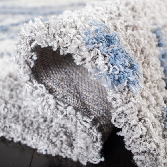 Plush Abstract Blue, Grey, and White Pattern Shag Rug