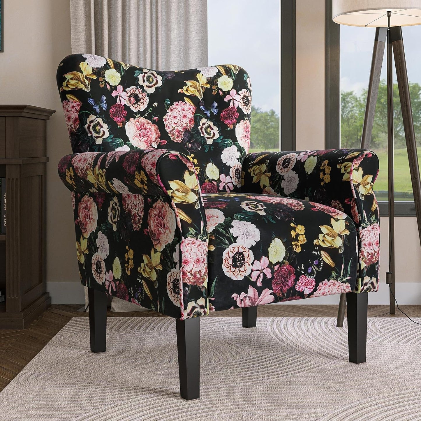 A Black Floral Wingback Accent Chair featuring a luxurious black fabric with intricate floral patterns, offering a modern-retro aesthetic. The chair has a tufted wingback design, wide cushioned seat, and padded armrests for ergonomic comfort. Supported by elegant tapered wood legs, it blends traditional charm with contemporary style. Ideal for a living room, office, or reading nook, this accent chair provides both comfort and sophistication.
