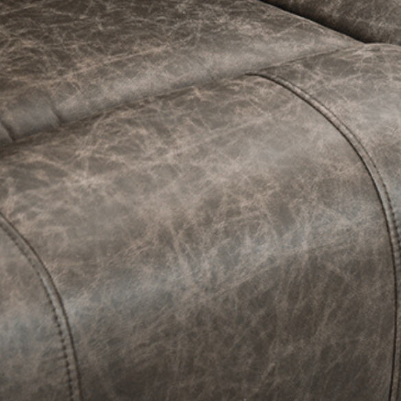 Grey leather recliner chair with ergonomic armrests, adjustable backrest, and concealed cup holder for ultimate comfort and relaxation. Features durable faux leather upholstery, supportive foam padding, and a sturdy FSC-certified wood frame. Perfect for living rooms, home theaters, or reading spaces.