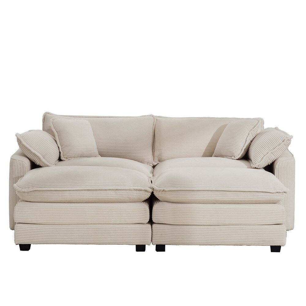 Luxurious cream beige velvet corduroy sofa with deep cushions, foam and pocket spring construction, sleek black plastic legs, offering sophisticated comfort and versatile style for modern living rooms, offices, and apartments.