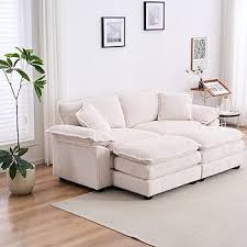Luxurious cream beige velvet corduroy sofa with deep cushions, foam and pocket spring construction, sleek black plastic legs, offering sophisticated comfort and versatile style for modern living rooms, offices, and apartments.