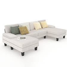 U-shaped sectional sofa with chaise lounges, featuring luxurious white velvet upholstery, high-density foam, and spring pack for ultimate comfort. Spacious enough to seat 4 people, with removable, machine-washable covers for easy cleaning. Perfect for family rooms or entertaining guests.