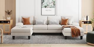 U-shaped sectional sofa with chaise lounges, featuring luxurious white velvet upholstery, high-density foam, and spring pack for ultimate comfort. Spacious enough to seat 4 people, with removable, machine-washable covers for easy cleaning. Perfect for family rooms or entertaining guests.