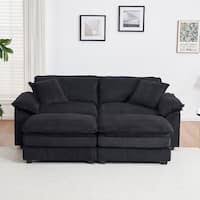 Modern black ribbed velvet corduroy sofa with foam cushioning and pocket spring system, featuring sturdy wood frame, plush back pillows, and sleek black plastic legs for ultimate comfort and style.