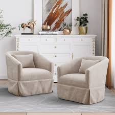 A set of two Beige Cream Swivel Accent Chairs featuring soft, neutral beige upholstery. Each chair is designed with a minimalist metal frame and elegant wood accents. The chairs include a 360-degree swivel base for easy movement and comfort, and they have plush foam and spring cushioning for support. Their versatile design fits a range of décor styles, making them perfect for living rooms, offices, bedrooms, or cozy reading spaces. The chairs are durable, sturdy, and built for long-lasting comfort.