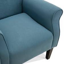 A stylish and elegant Baby Blue Wingback Accent Chair with a tufted backrest, soft linen fabric, and padded armrests. The chair features a wide cushioned seat and sleek, tapered wood legs with rubber inserts. Its modern design with retro-inspired elements adds a sophisticated touch to any room, offering both comfort and timeless appeal for lounging, reading, or relaxing. The chair is ideal for living rooms, offices, or sunrooms.