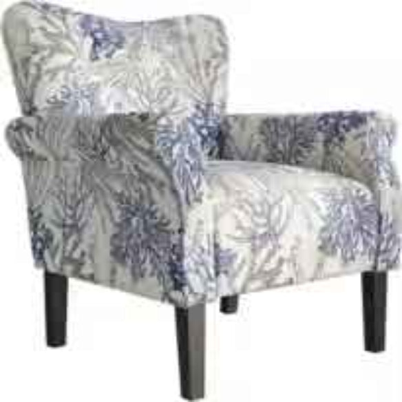 A stylish Blue Coral Accent Chair featuring a vibrant blue coral fabric with a unique pattern. The chair has a tufted wingback design, gracefully tapered wood legs, and padded armrests for optimal comfort. It combines modern sophistication with a classic aesthetic, ideal for any living room, office, or reading nook.