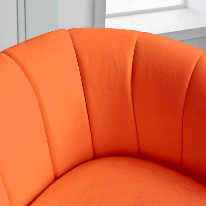 Orange velvet barrel swivel chair with lumbar pillow, featuring a 360-degree swivel design, high-density foam cushioning, and sturdy metal base. Adds bold color and modern elegance to any room, perfect for relaxation and style.