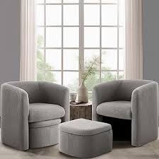Velvet grey barrel accent chair with hidden ottoman, featuring flared arms, foam-filled seat and back, and matching toss pillows. Space-saving design with storable ottoman underneath. Sturdy solid wood frame with sled base for durability and stability. Ideal for adding style and comfort to any living space.