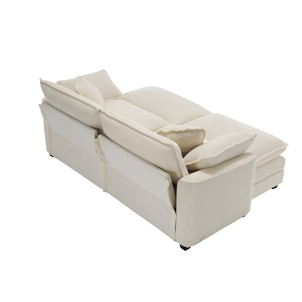 Luxurious cream beige velvet corduroy sofa with deep cushions, foam and pocket spring construction, sleek black plastic legs, offering sophisticated comfort and versatile style for modern living rooms, offices, and apartments.