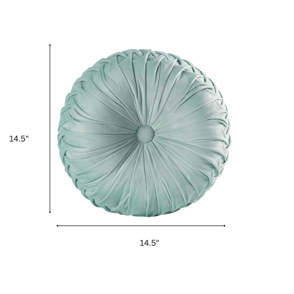 Aqua velvet round throw pillows with hand-sewn pleats and central button, set of two 14.5-inch decorative cushions styled on a modern sofa.