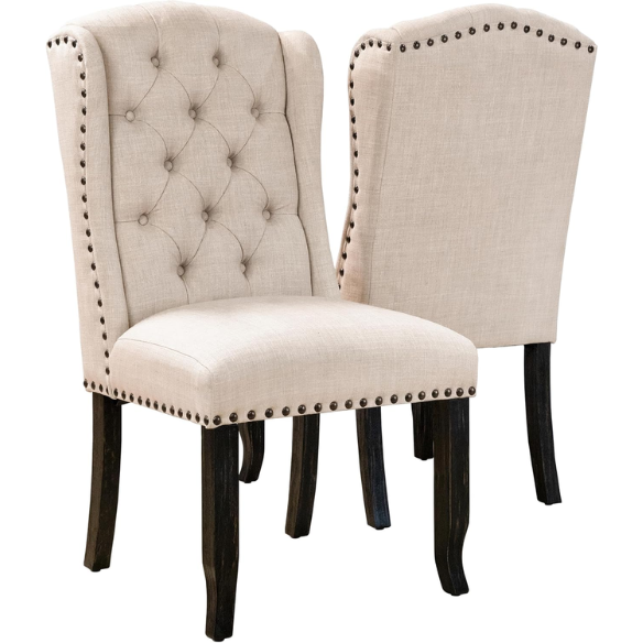 Set of two beige upholstered dining chairs with wingback design, button-tufted backrest, nailhead trim, and espresso-finished wooden legs