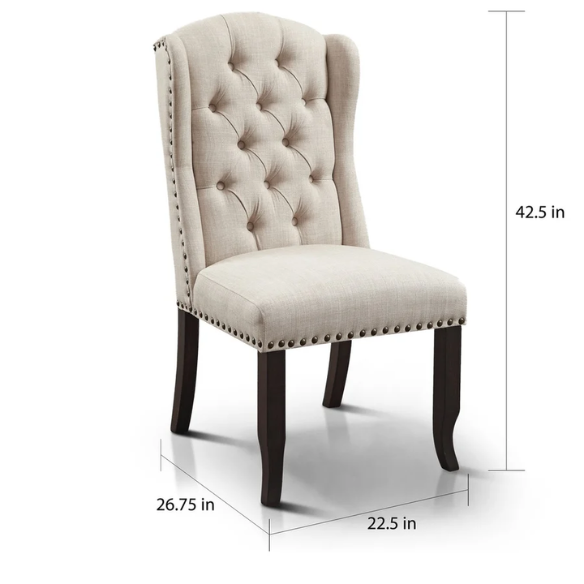 Set of two beige upholstered dining chairs with wingback design, button-tufted backrest, nailhead trim, and espresso-finished wooden legs