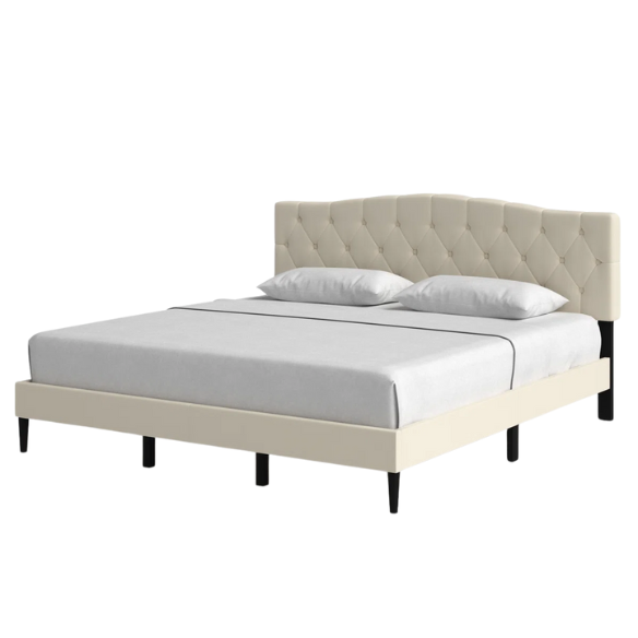 Beige king-size upholstered platform bed with camelback tufted headboard, foam padding, and low-profile wood frame with underbed clearance