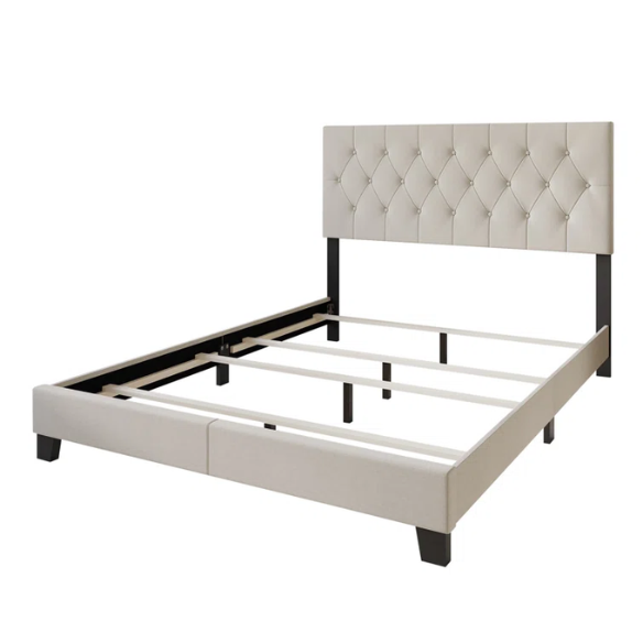 Beige linen full size upholstered bed with button tufted headboard and low-profile legs