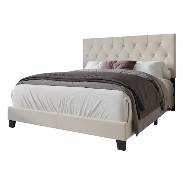 Beige linen full size upholstered bed with button tufted headboard and low-profile legs