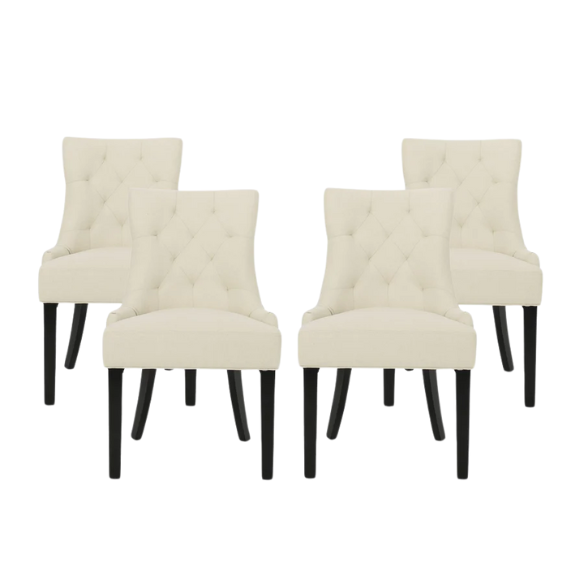 Set of four beige upholstered dining chairs featuring diamond tufting, armless design, sloped sides, and espresso brown wooden legs.