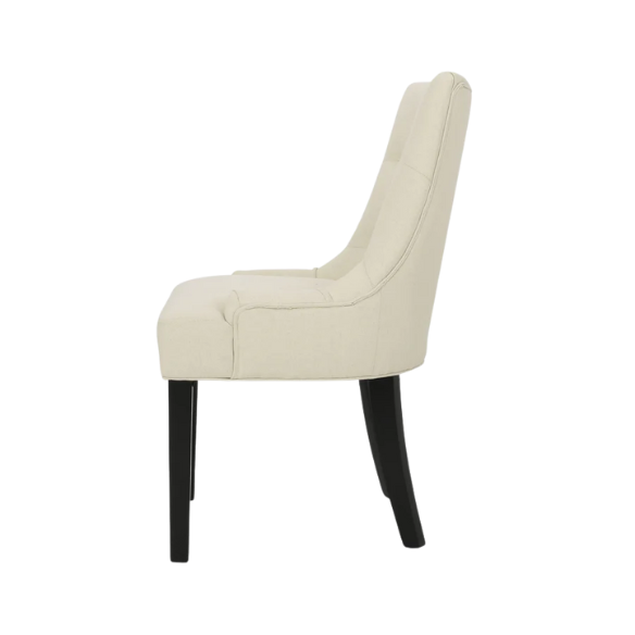 Set of four beige upholstered dining chairs featuring diamond tufting, armless design, sloped sides, and espresso brown wooden legs.