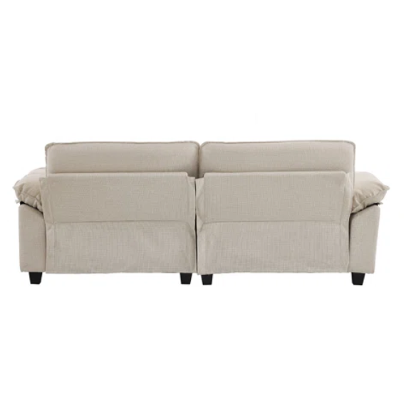 Beige modular cloud sofa with pillow top arms, deep foam cushions, and matching ottoman