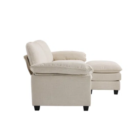 Beige modular cloud sofa with pillow top arms, deep foam cushions, and matching ottoman