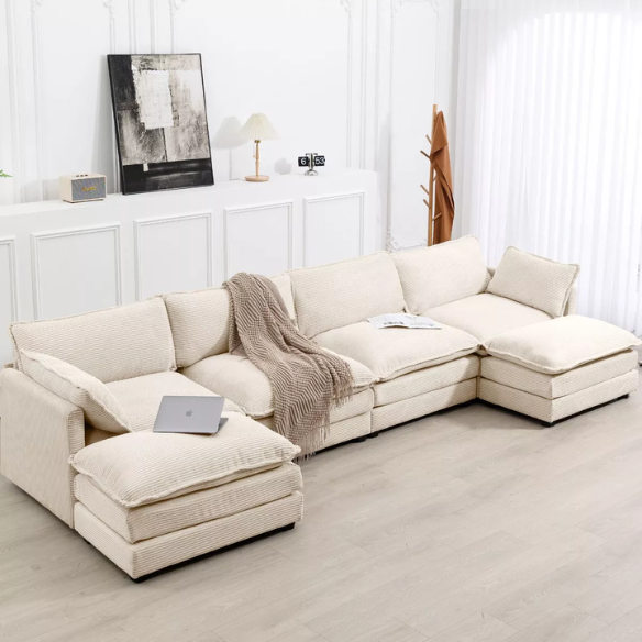 Beige corduroy 4-seat modular sectional sofa with two matching ottomans, featuring plush high-pile fabric, durable frame, and soft high-resilience cushions.