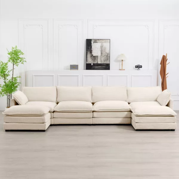 Beige corduroy 4-seat modular sectional sofa with two matching ottomans, featuring plush high-pile fabric, durable frame, and soft high-resilience cushions.