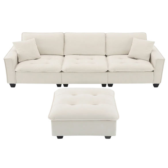 Beige suede L-shaped sectional sofa with removable ottoman, tufted seat cushions, and two matching accent pillows