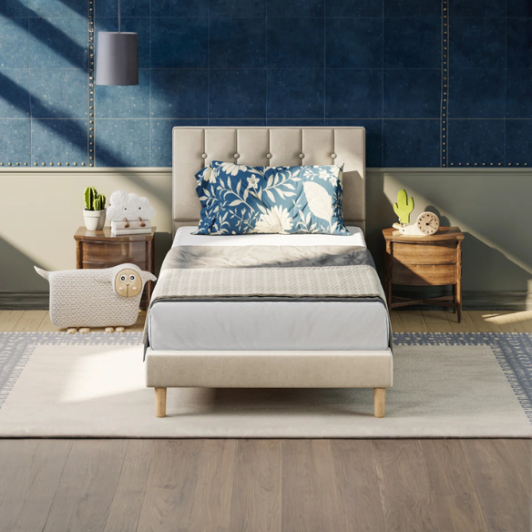 Beige twin bed frame with tufted velvet headboard, metal and wood construction, and 7.9-inch under-bed storage clearance.