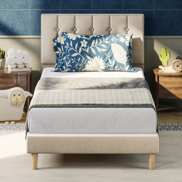 Beige twin bed frame with tufted velvet headboard, metal and wood construction, and 7.9-inch under-bed storage clearance.