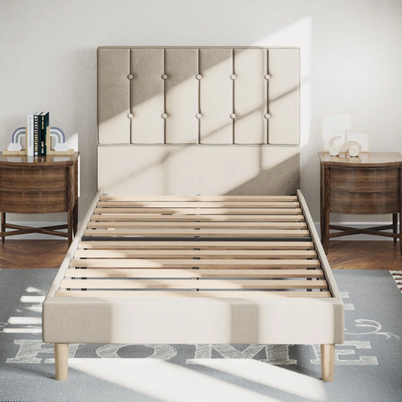 Beige twin bed frame with tufted velvet headboard, metal and wood construction, and 7.9-inch under-bed storage clearance.