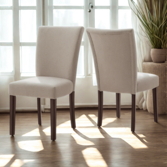 Set of 2 upholstered Parson dining chairs in beige fabric with espresso-finished wood legs and high backs, perfect for traditional and modern dining rooms.