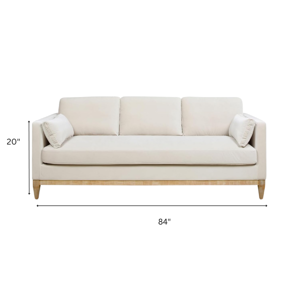 Beige velvet 3-seater sofa with square track arms, feather-down cushions, and natural wood legs, ideal for modern and transitional living rooms.