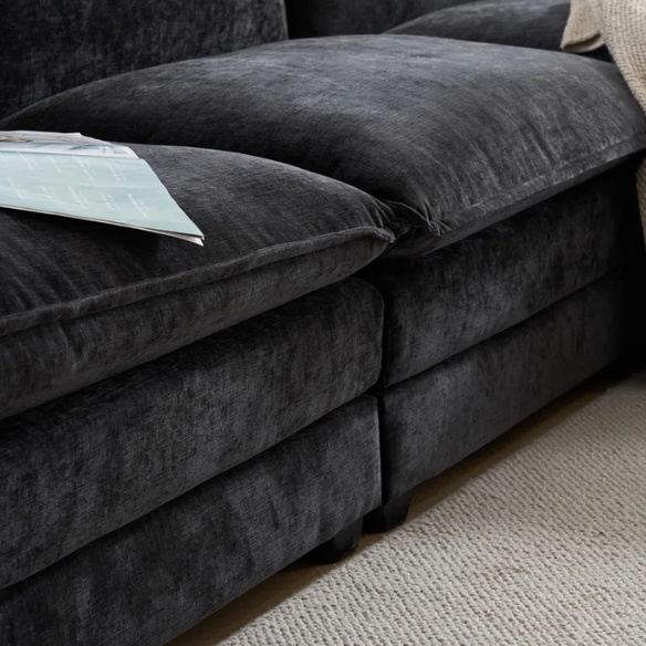 Black chenille modular cloud sofa with deep foam cushions, pillow top arms, and matching ottoman