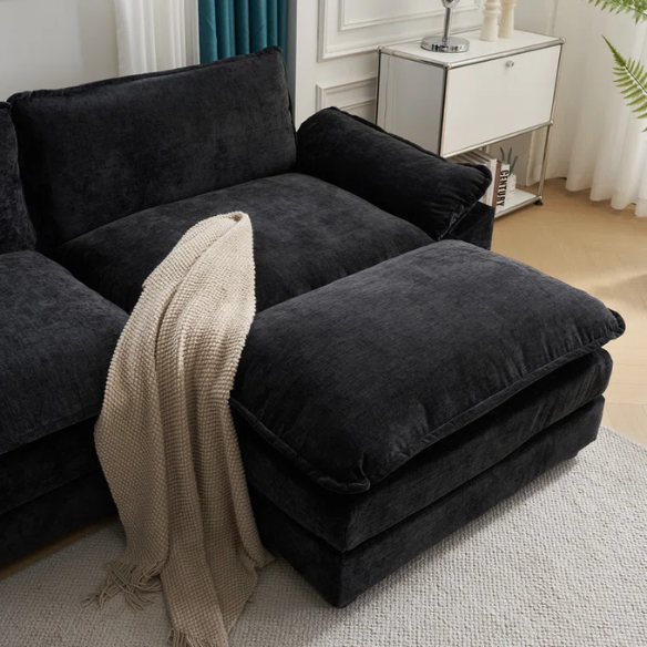 Black chenille modular cloud sofa with deep foam cushions, pillow top arms, and matching ottoman