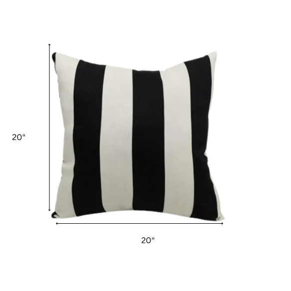 Striped accent pillow in black and cream – weather-resistant and reversible with plush polyester fill, ideal for indoor or outdoor use on patios, decks, or sofas.