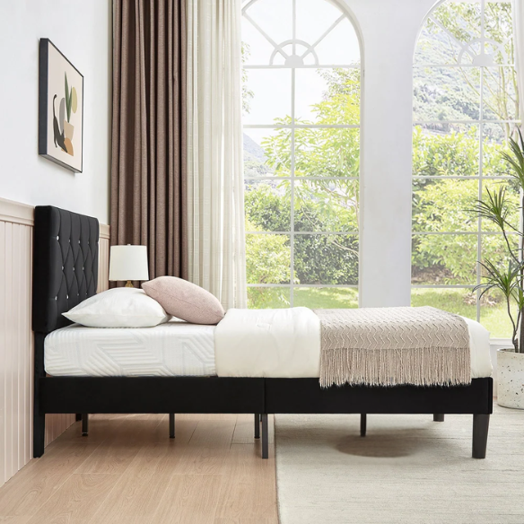 Black twin size upholstered bed frame with diamond-tufted velvet headboard, gem detailing, and modern platform design