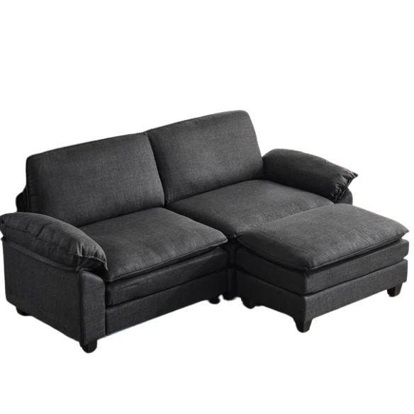 Black modular cloud sofa with deep foam cushions, pillow top arms, and matching ottoman