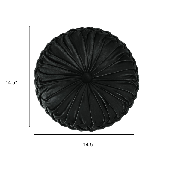 Black velvet round throw pillows with hand-sewn pleats and central button, set of two 14.5-inch plush decorative cushions styled on a modern neutral sofa.