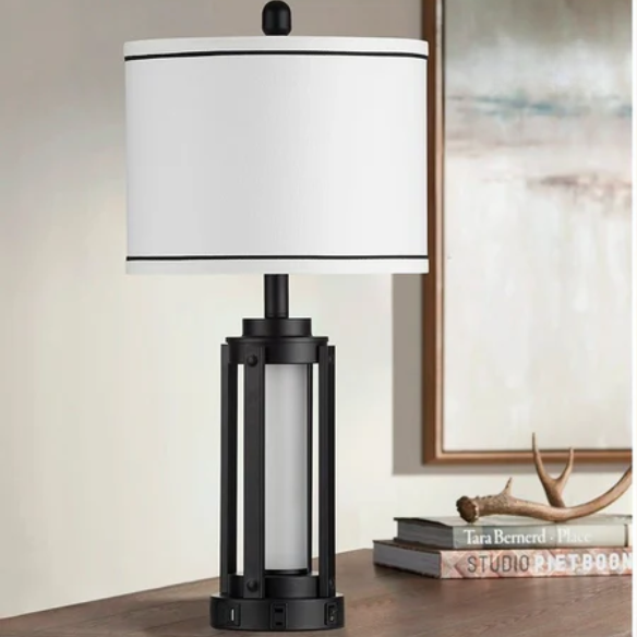 Set of two 25.3-inch modern black table lamps featuring white drum shades with black trim, built-in nightlight, USB and Type-C charging ports, and AC outlet on each base.
