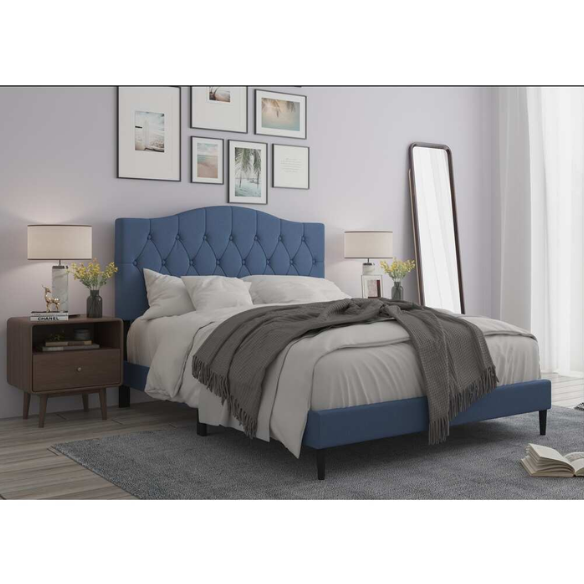 Blue upholstered king-size platform bed with tufted camelback headboard, solid wood frame, and slatted base with center support legs