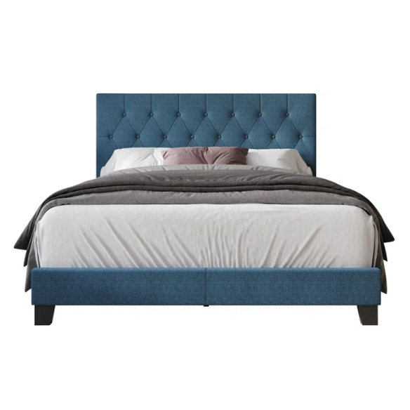 Blue linen full size upholstered bed with button tufted headboard and low-profile legs