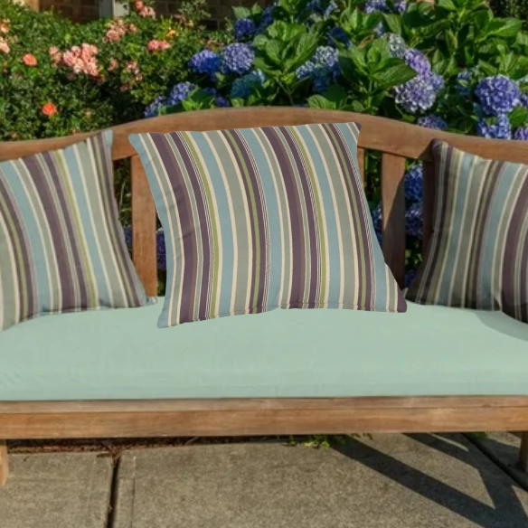 Striped accent pillow in blue, olive green, and beige – reversible, weather-resistant, and overstuffed with plush polyester fill for stylish indoor or outdoor comfort.