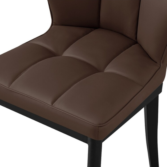 Set of two brown mid-century modern faux leather dining chairs with checkered stitching and metal legs