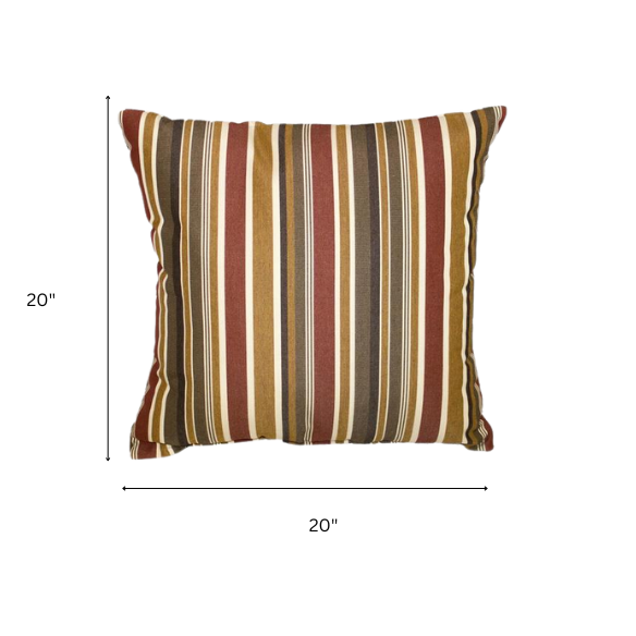 Striped accent pillow in brown, red, and beige – reversible, weather-resistant, and overstuffed with polyester fill for durable comfort indoors or outdoors.