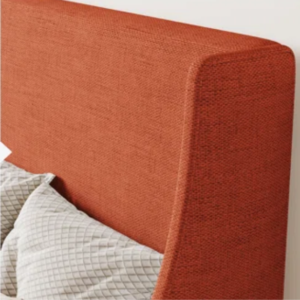 Burnt orange upholstered queen platform bed with wingback headboard, tapered legs, and slatted base – no box spring required