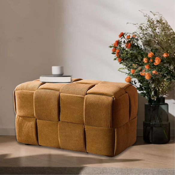Burnt orange velvet ottoman with engineered wood frame, modern design, and square woven shape