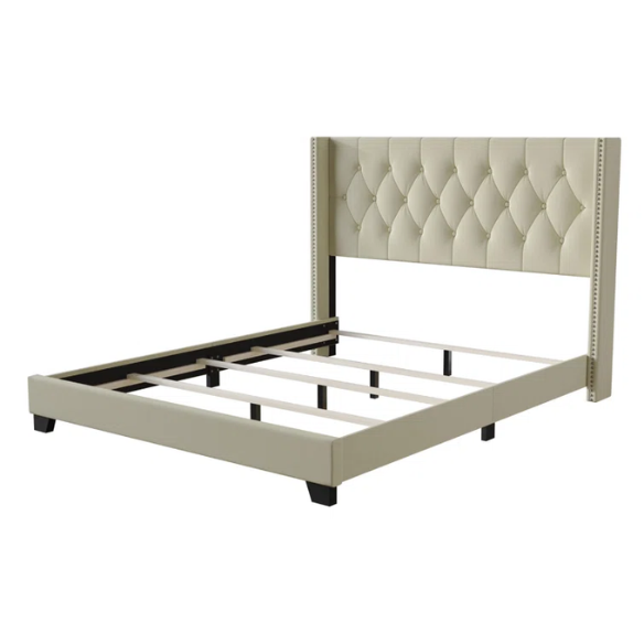 Buttercup yellow linen full size upholstered bed with button-tufted wingback headboard, nailhead trim, and low-profile frame.