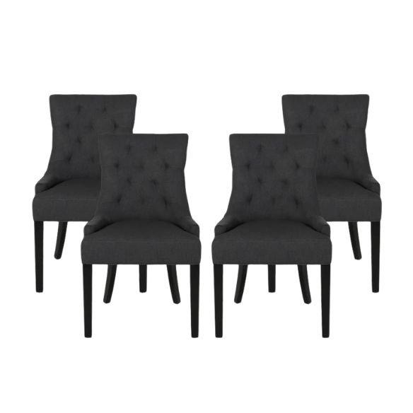 Set of four dark charcoal grey upholstered dining chairs featuring diamond tufted backs, armless design, sloped sides, and espresso wood legs.
